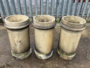Buff cylindrical chimney pots