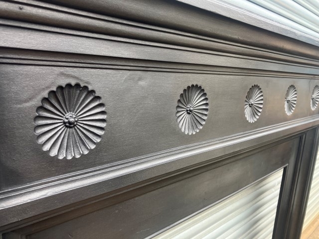 Cast iron fire surround