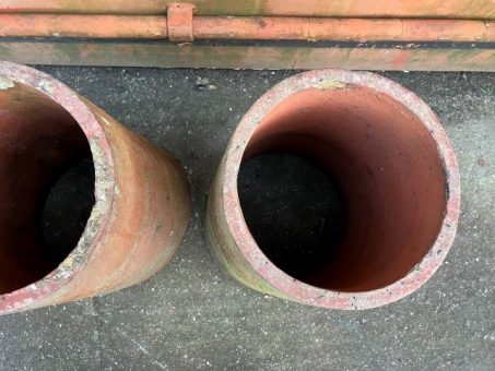 A pair of ribbed chimney pots