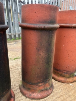 Trio of terracotta chimney pots